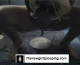 A woman squats over a plate and poops.